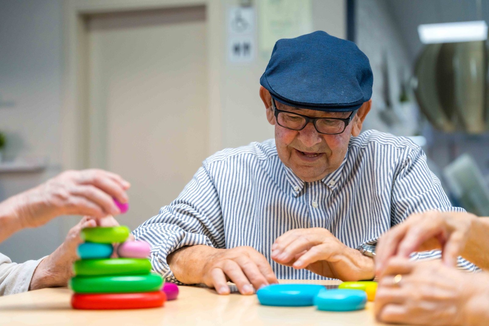 elder-man-playing-skill-games-in-a-nursing-home-2024-12-10-01-51-19-utc_11zon
